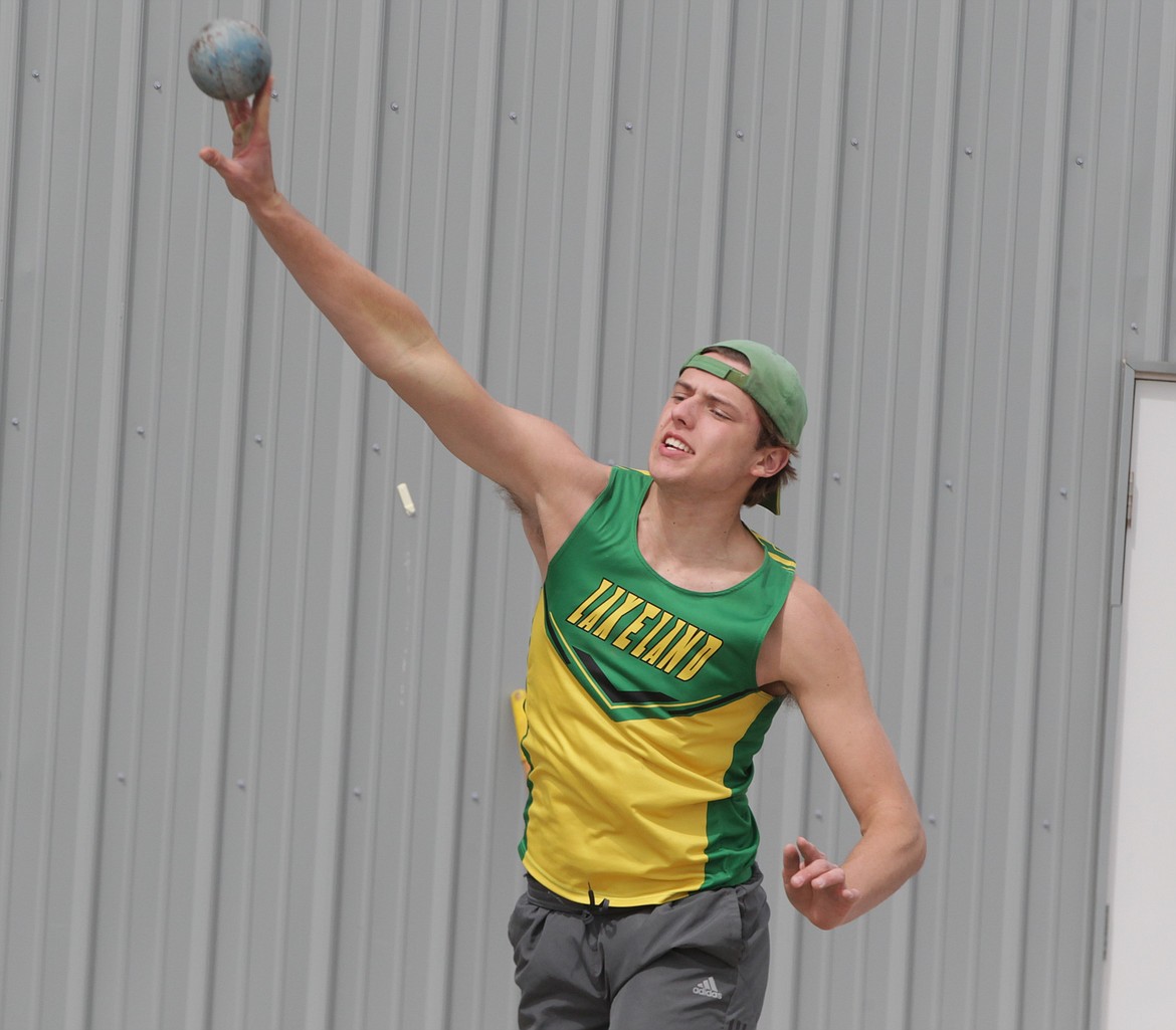 JASON ELLIOTT/Press
Lakeland High senior Grant Roth makes an attempt during the boys shot put at the 4A Region 1 track and field meet at Coeur d'Alene High. Roth qualified for state next Friday and Saturday at Dona Larsen Park in Boise, finishing second with a throw of 41 feet, 10 inches.