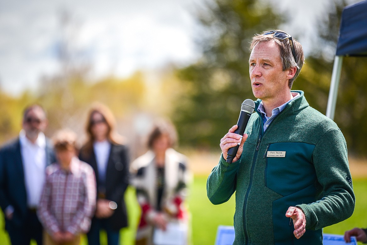 Paul Travis, executive director of the Flathead Land Trust, speaks during a ribbon-cutting ceremony at Somers Beach State Park on Thursday, May 12. (Casey Kreider/Daily Inter Lake)
