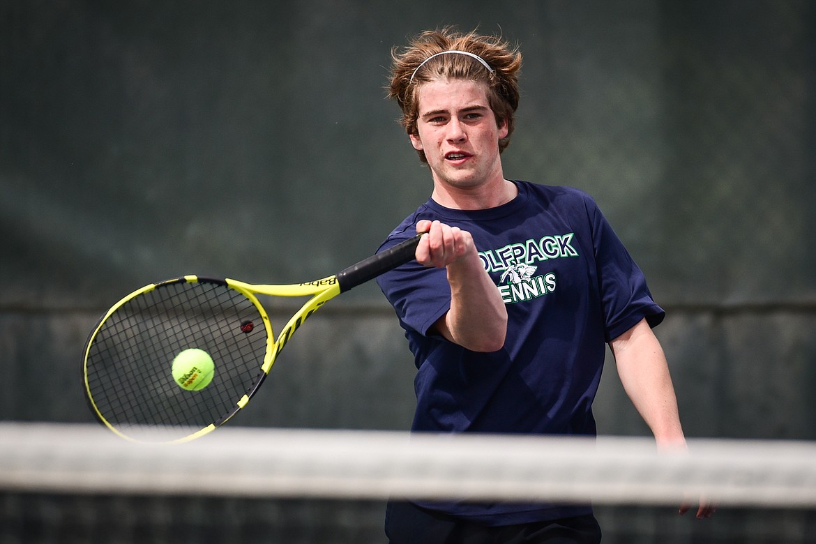 Glacier's Harrison Sanders eyes a return against Flathead's Quaid Ring at Flathead Valley Community College on Thursday, May 12. (Casey Kreider/Daily Inter Lake)