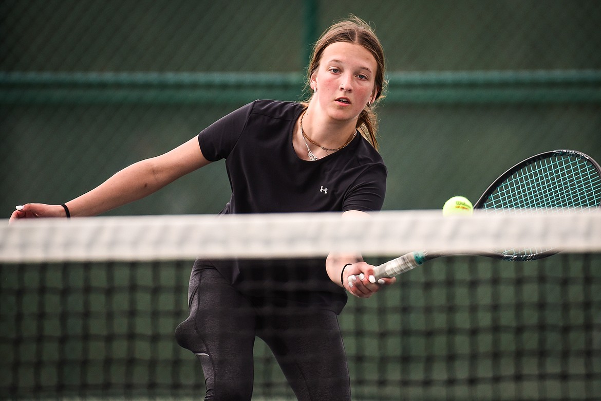 Flathead's Alexis Kersten hits a return against Glacier's Naomi Jutzi at Flathead Valley Community College on Thursday, May 12. (Casey Kreider/Daily Inter Lake)