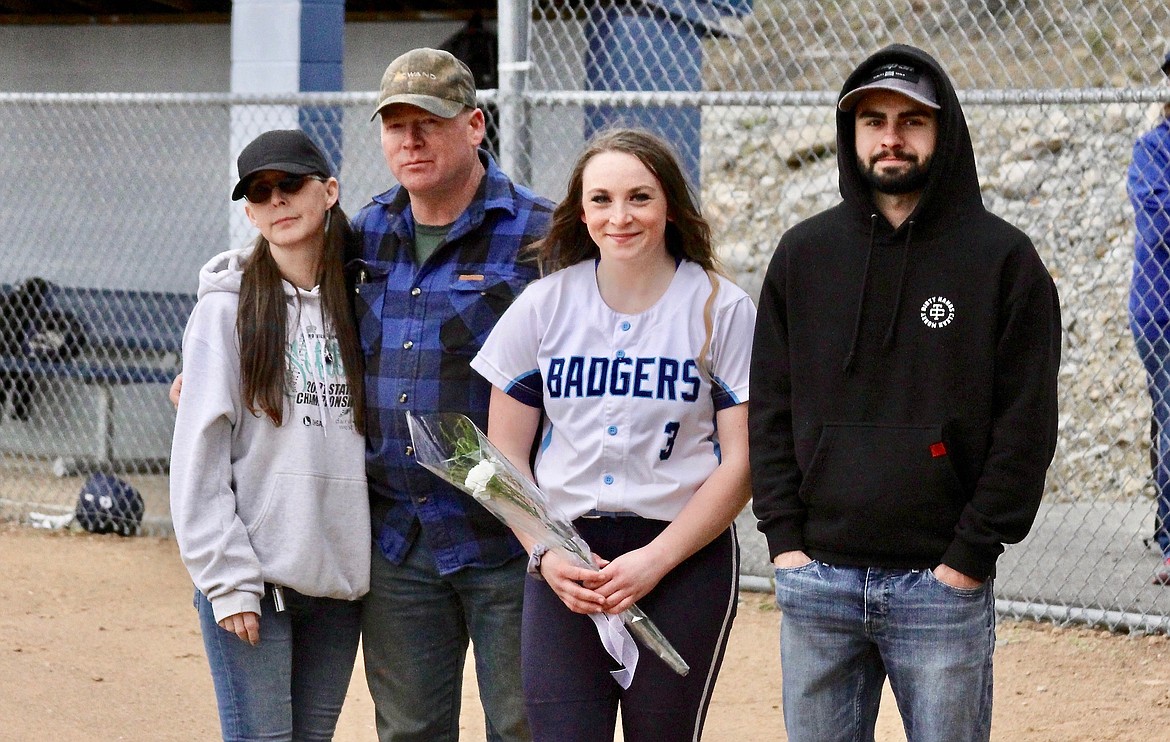 Charley Anne Pruitt and her family honored at softball senior night.