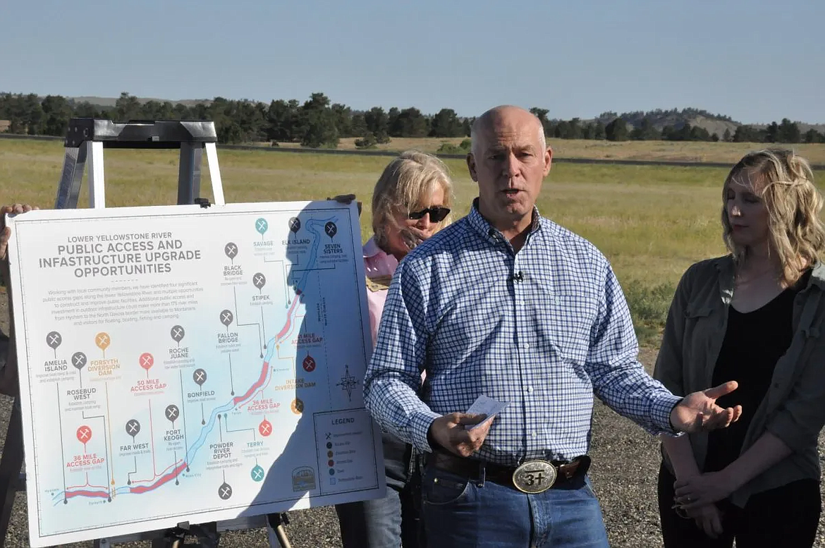 Gov. Greg Gianforte speaks at an event in Forsyth announcing a $4 million Montana Fish, Wildlife and Parks investment in recreational infrastructure that could help bring Montanans who’ve left back to the state. “We want people to come back to Forsyth, Miles City, Glendive, Sidney — particularly people who grew up here,” Gianforte told attendees on June 16, 2021. “When they come back home, they bring Montana values with them.” (Photo by Amanda Eggert/MTFP)