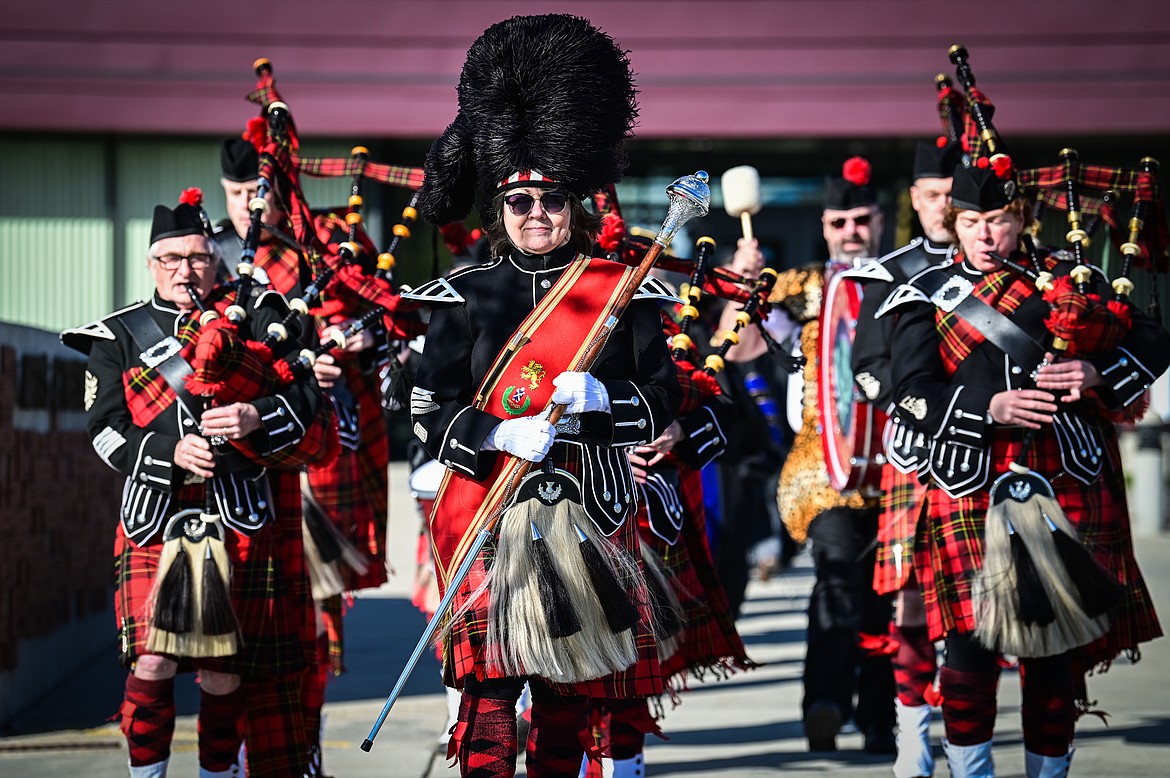 The Montana Highlanders lead the processional at the Flathead Valley Community College Class of 2022 commencement ceremony on Friday, May 13. (Casey Kreider/Daily Inter Lake)
