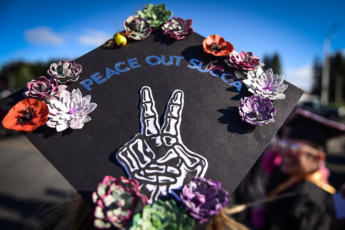 A graduate's decorative mortarboard during the processional at the Flathead Valley Community College Class of 2022 commencement ceremony on Friday, May 13. A total of 304 graduates earned 319 degrees and certificates (Casey Kreider/Daily Inter Lake)