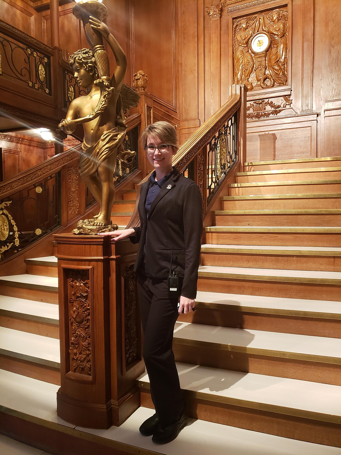 Kaylee Jukich-Fish poses on a replica of the RMS Titanic's grand stairway. (Photo courtesy Kaylee Jukich-Fish)