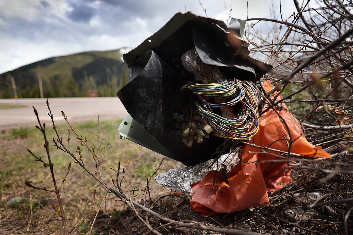 One of several damaged phone connection junctions that can be found in Essex. Residents say many have been open to the elements for years. (Jeremy Weber/Daily Inter Lake)