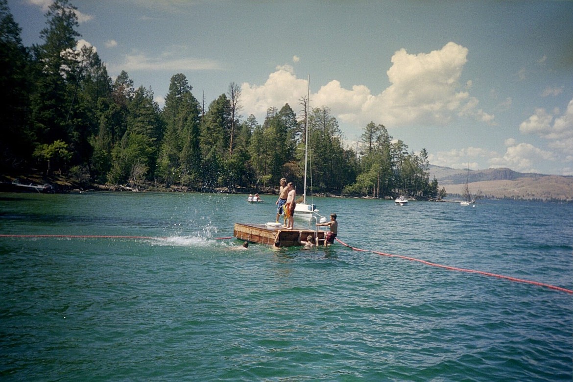 Members of Boy Scout Troop 1933 brave Flathead Lake to visit Melita Island in 2004. (photo provided)