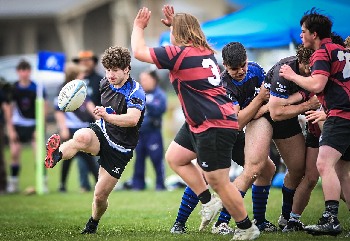 Flathead Valley Black and Blue's Fin Nadeau (9) punts the ball into Missoula Mud Dog territory during the championship game of the State Rugby Tournament at Glacier High School on Saturday, May 14. (Casey Kreider/Daily Inter Lake)