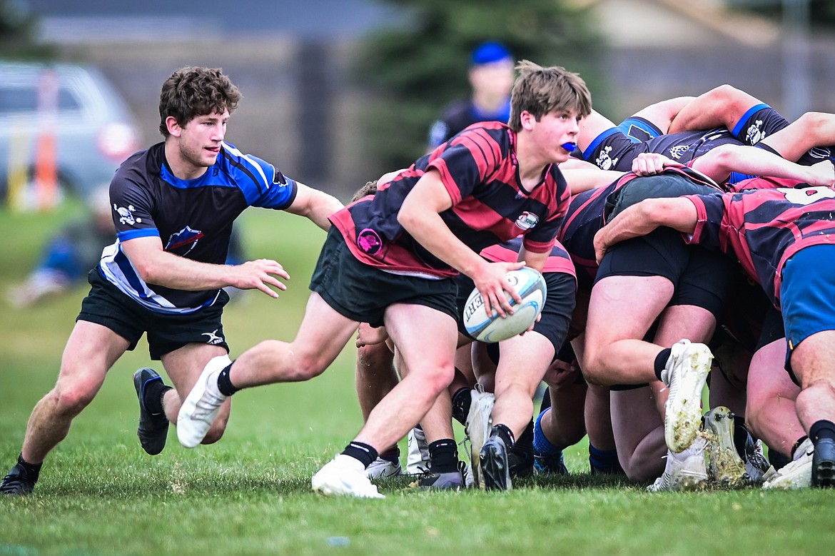 Flathead Valley Black and Blue's Fin Nadeau (9) chases down a Missoula Mud Dog opponent outside a scrum during the championship game of the State Rugby Tournament at Glacier High School on Saturday, May 14. (Casey Kreider/Daily Inter Lake)