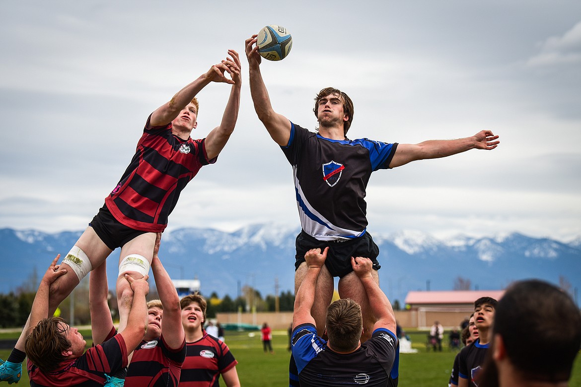 Flathead Valley Black and Blue's Luke Leech (4) wins possession off a lineout against the Missoula Mud Dogs during the championship game of the State Rugby Tournament at Glacier High School on Saturday, May 14. (Casey Kreider/Daily Inter Lake)