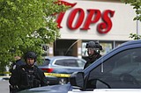 10 dead, suspect arrested in mass shooting at supermarket