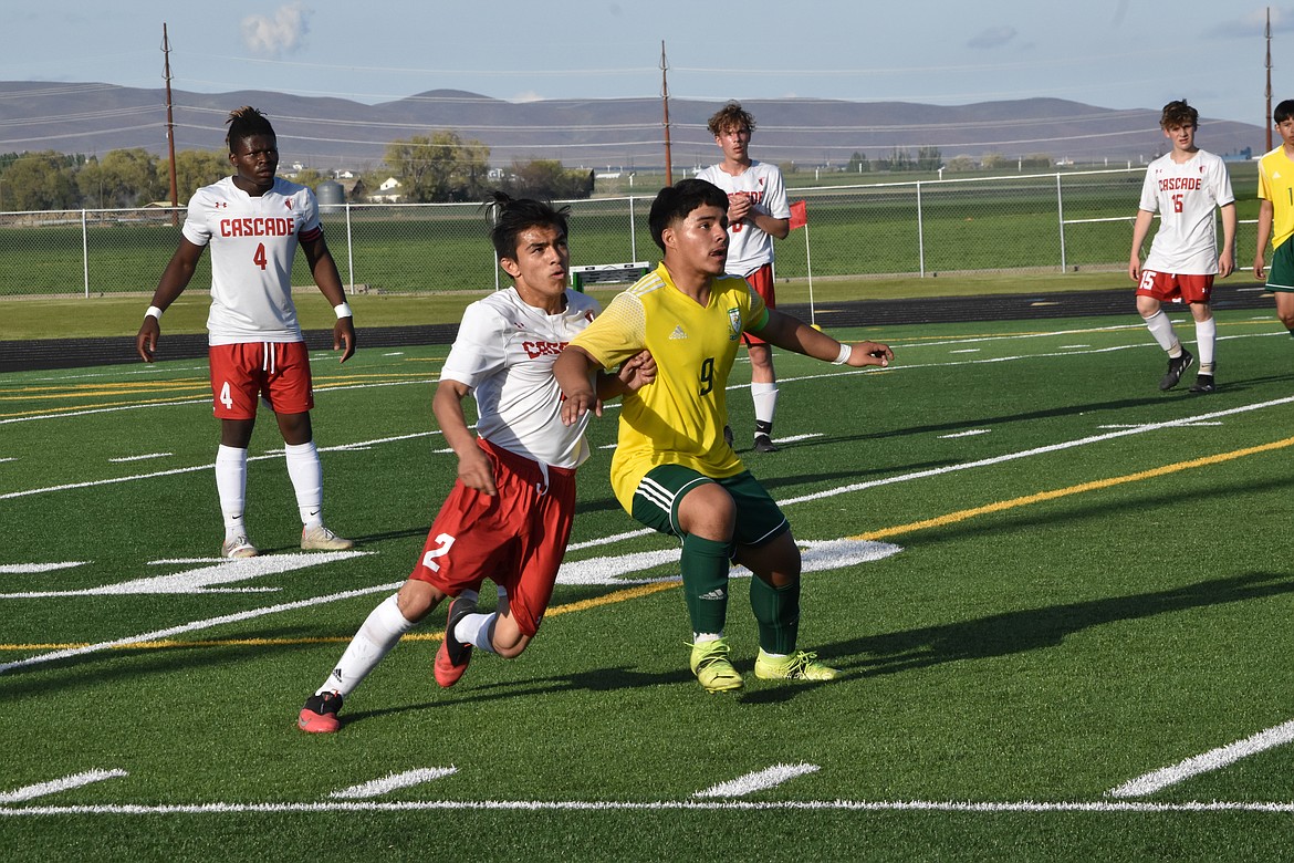 The game between Quincy High School and Cascade High School was an aggressive one with both teams performing well defensively.