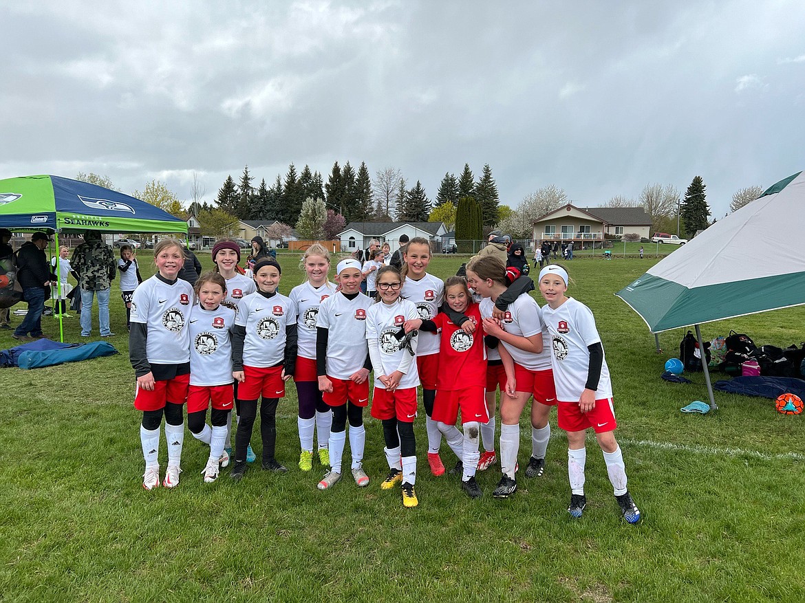 Courtesy photo
The Timbers-Thorns North FC 2011 (yellow) girls soccer team placed second in the gold bracket at the 31st aAnnual Bill Eisenwinter Hot Shot Tournament. Thorns goals were scored by Brightyn Gatten (1 goal), Olivia Nusser (1 goal) and Aubrey Sargent (3 goals). On May 14, the Thorns secured a 3-2 win against the Sandpoint Strikers in Hayden. Thorns goals were scored by Hailey Viaud, Aubrey Sargent and Brightyn Gatten. From left are Emily Hackett, Victoire James, Kylie Lorona, Hailey Viaud, Eloise Elgee, Evelyn Haycraft, Presley Moreau, Vivian Hartzell, Sophia Harrington, Brightyn Gatten, Olivia Nusser and and Aubrey Sargent.