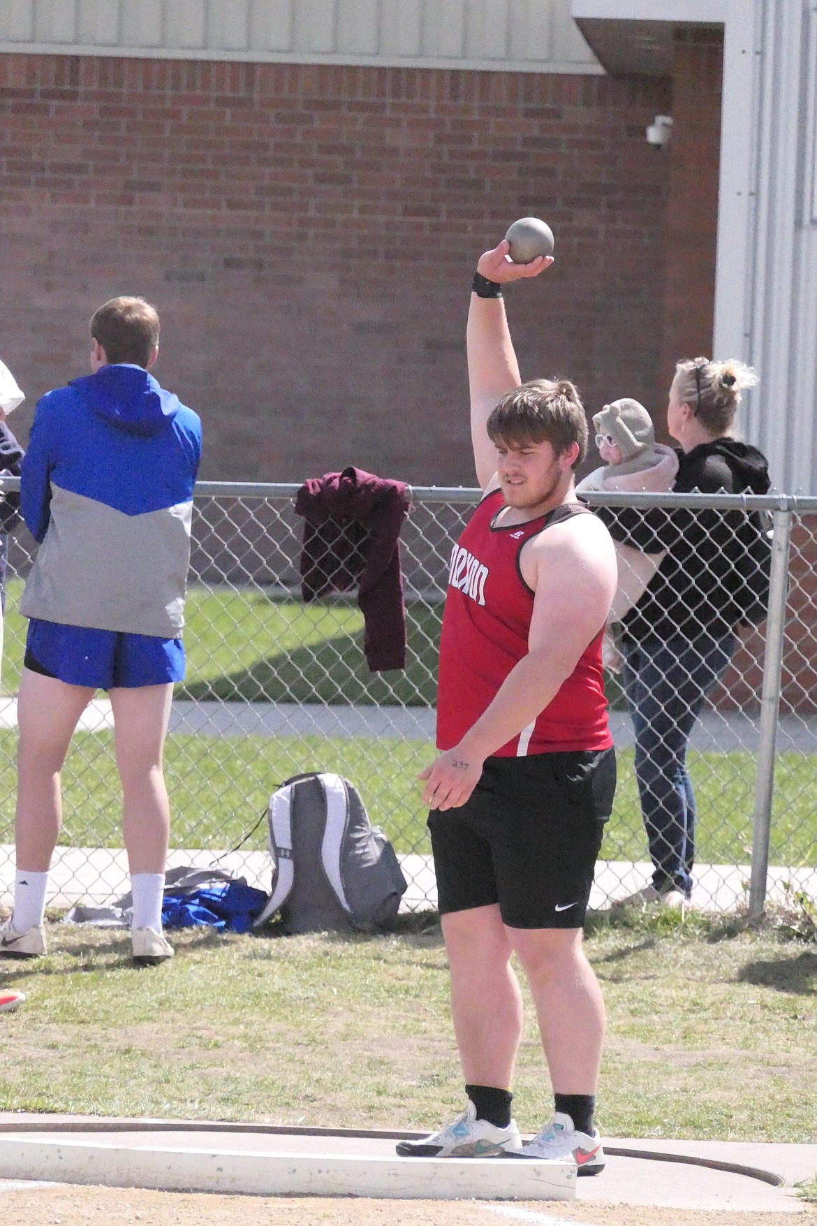 Noxon shot putter Cade VanVleet prepares to throw at this past weekend's 14C District track meet in Missoula.  VanVleet won the event with a 51-plus foot throw. (Chuck Bandel/VP-MI)