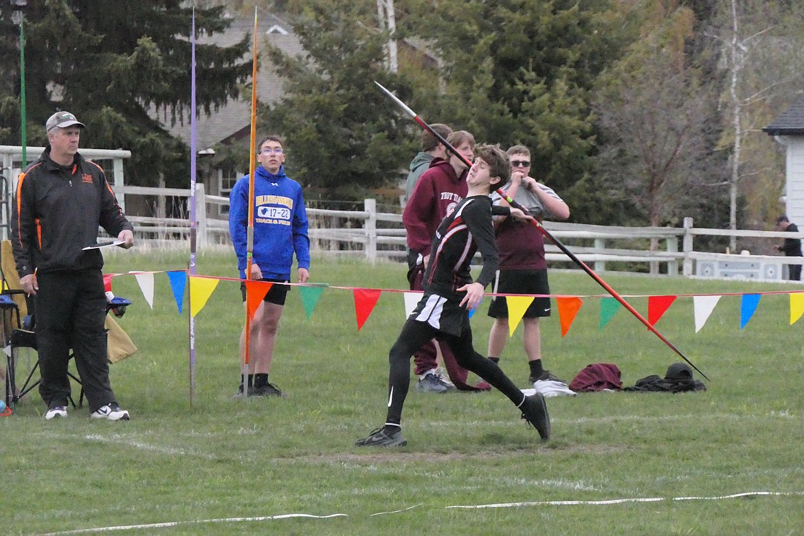 Plains' Aaron Pfister lets the spear fly during javelin competition at Saturday's 7B District meet in Bigfork. (Chuck Bandel/VP-MI)