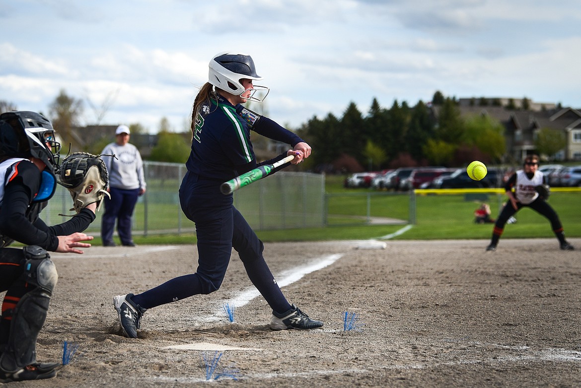Glacier's Kenadie Goudette (2) connects on a double against Flathead at Kidsports Complex on Tuesday, May 17. (Casey Kreider/Daily Inter Lake)