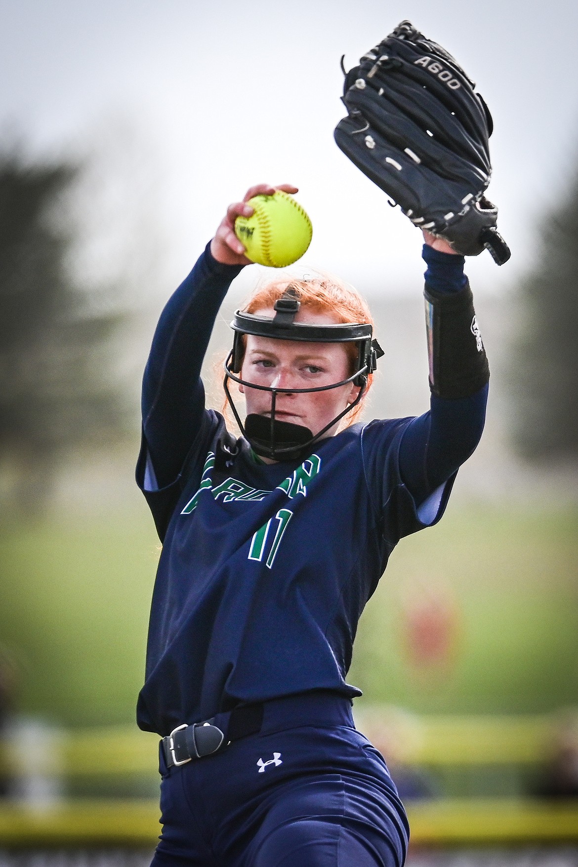 Glacier pitcher Alli Kernan (11) delivers to a Flathead batter during crosstown softball at Kidsports Complex on Tuesday, May 17. (Casey Kreider/Daily Inter Lake)