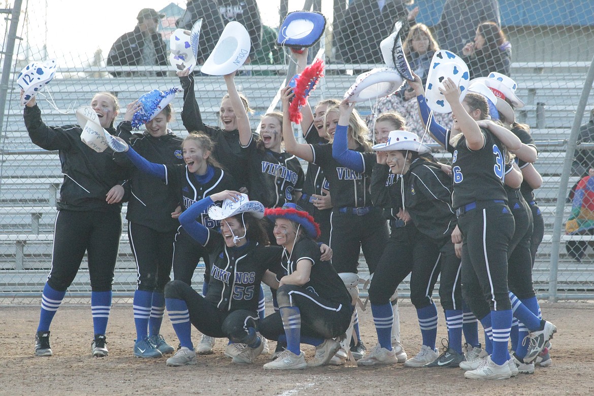 MARK NELKE/Press
Coeur d'Alene High softball players pose with their "rally hats" after winning the 5A Region 1 softball championship last week.