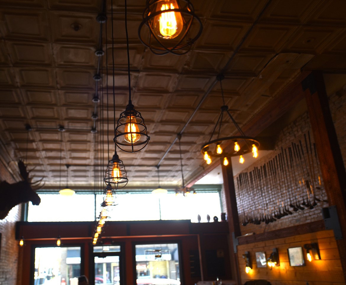 Several bulbs hang above the new bar. (Scot Heisel/Lake County Leader)
