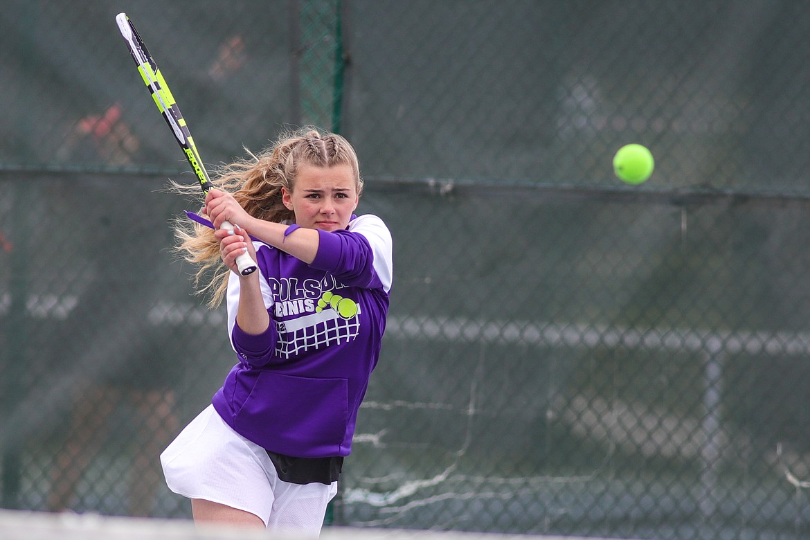 Polson's Lucy Violett returns a volley at the Northwest A divisional at FVCC on Thursday, May 19. (JP Edge/Hungry Horse News)