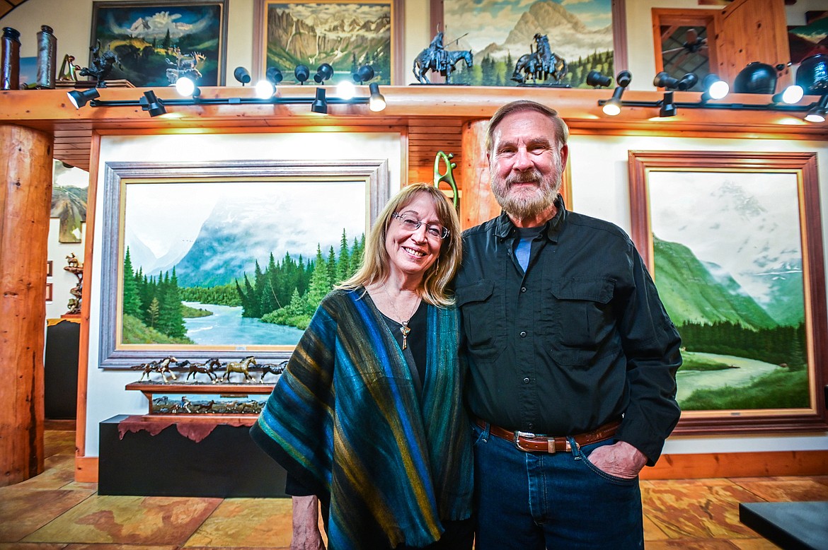 Janet and Michael G. Booth inside their gallery in Hungry Horse on Thursday, May 19. (Casey Kreider/Daily Inter Lake)