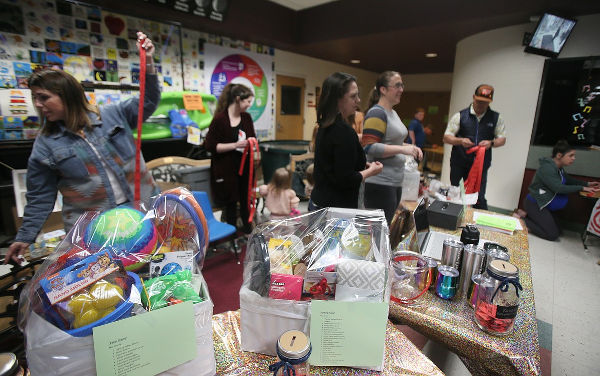 Tickets aplenty were sold for numerous raffle baskets Thursday during Fernan STEM Academy's music-themed STEM night.