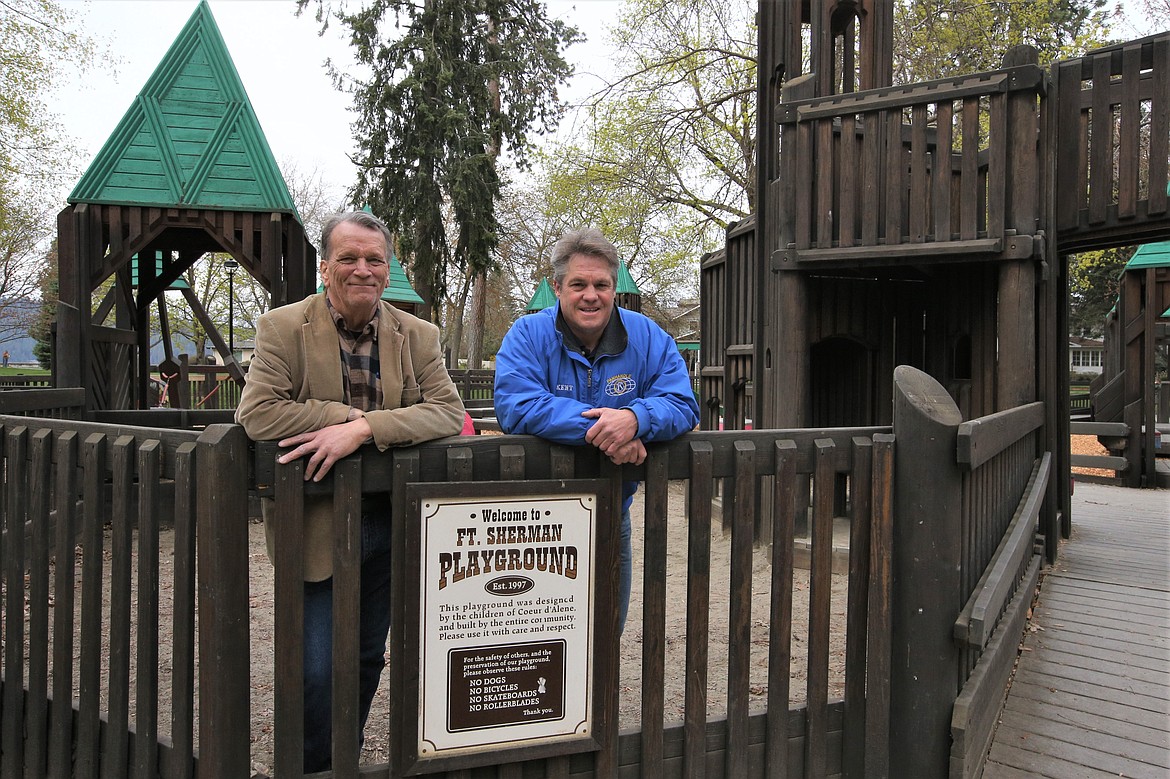 Chris Guggemos, Panhandle Kiwanis Club member, and Jon Dohm, club president, pose at Fort Sherman Playground.