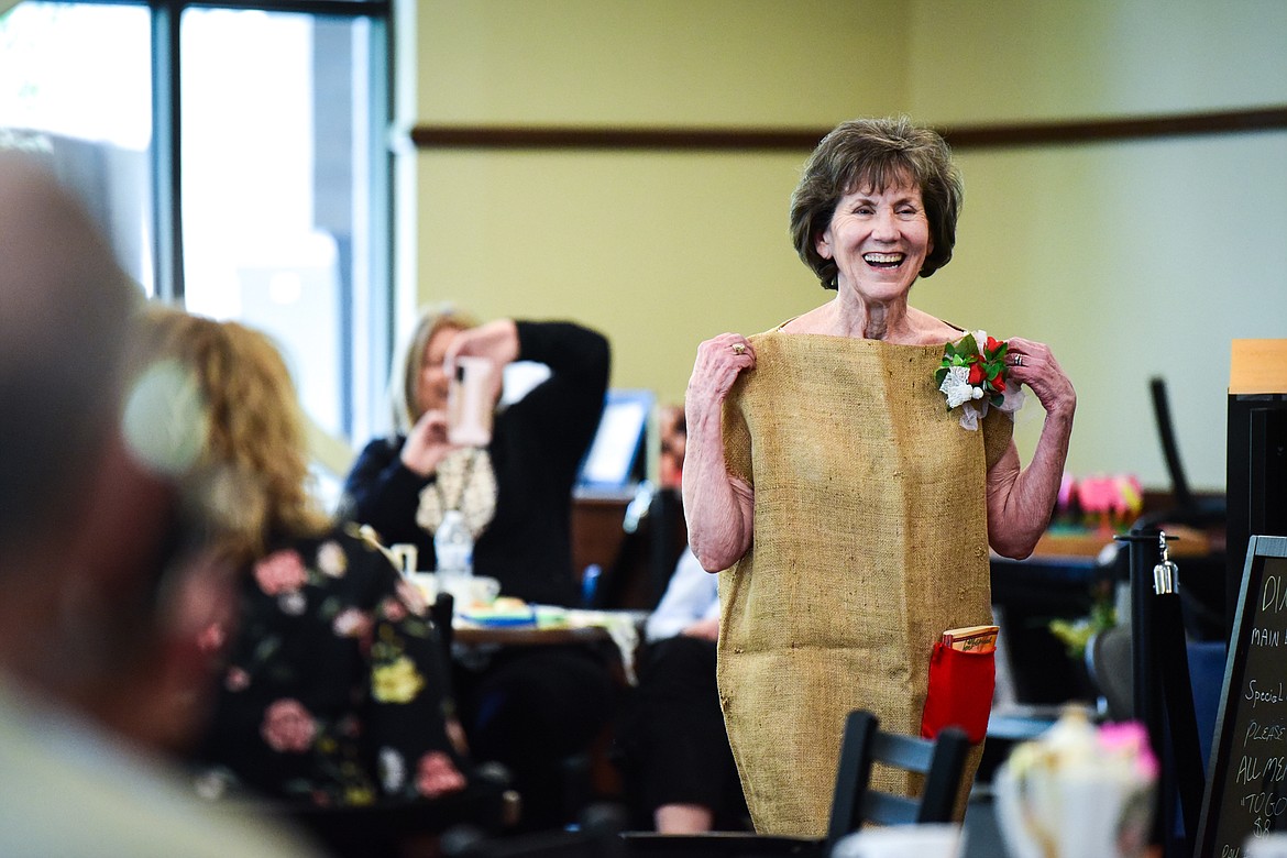 A model wears a fashion creation made from a burlap sack during the May Tea & Style Show at the Kalispell Senior Center on Saturday, May 21. The annual fundraiser requires about 20 volunteers and the style show, a mock fashion show, is written, coordinated and designed by resident Rosainne Taylor. (Casey Kreider/Daily Inter Lake)