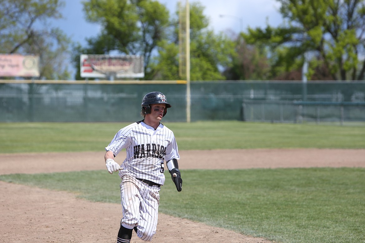 Dane Isaak runs from second to third base in the Warrior’s 5-2 win over Mount Vernon Christian on May 21, 2022.