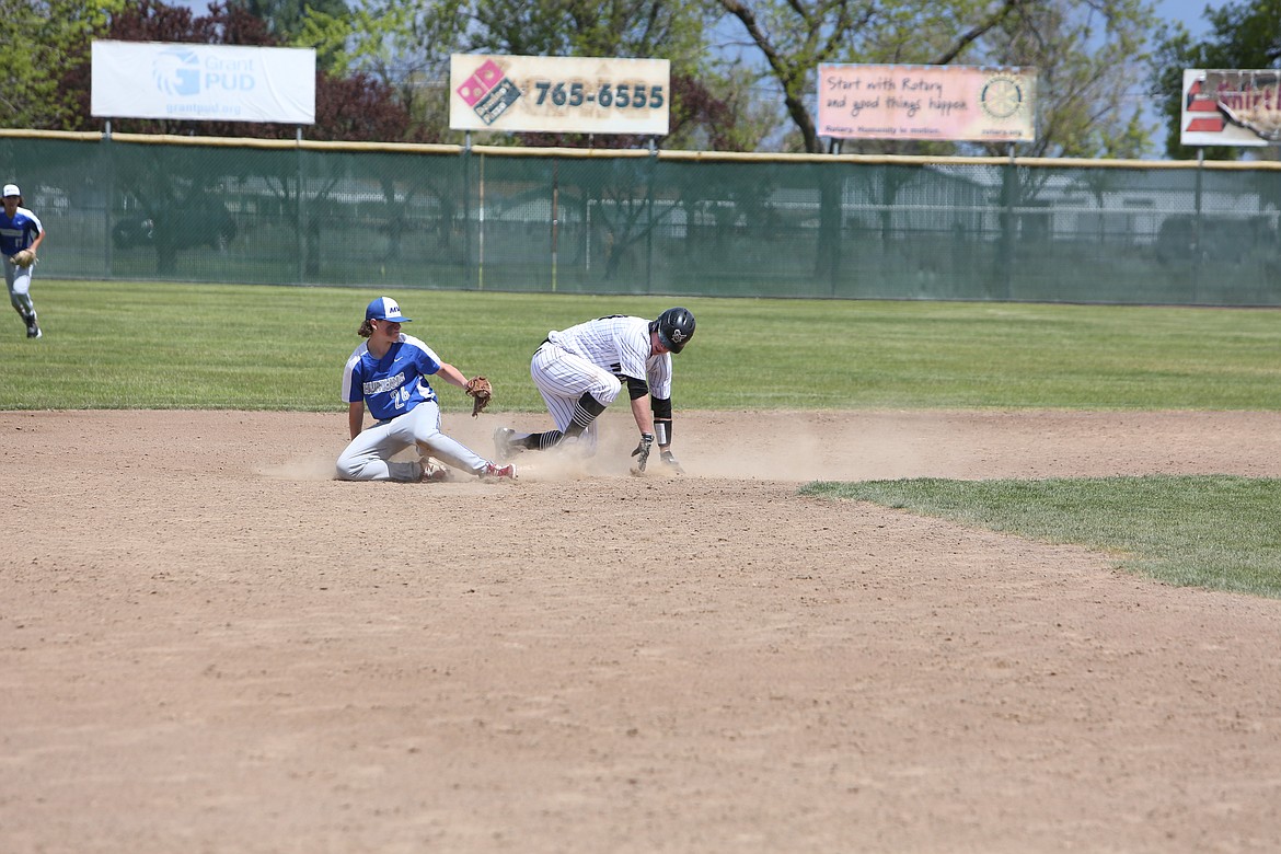 ACH’s Reece Isaak slides into second base in the Warrior’s 5-2 win over Mount Vernon Christian on May 21, 2022.
