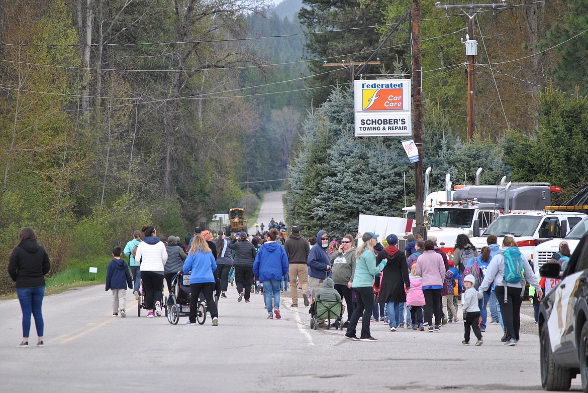 At the 10:00 a.m. start time on Thursday May 19, it was 44 degrees and spitting snow. But that didn't deter a flurry of colorful K-6 grade runners each representing their school colors in the 15th Annual Mineral County Fun Run. St. Regis won for the school with the best 5K average time, Superior came in 2nd, and Alberton was 3rd. (Amy Quinlivan/Mineral Independent)