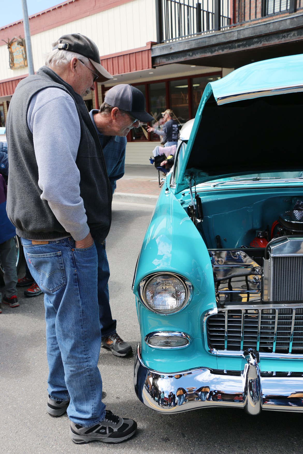 A pair of classic car enthusiasts check out one of that classic and vintage cars packing the streets of downtown Sandpoint as Lost in the '50s returned for its 35th anniversary.