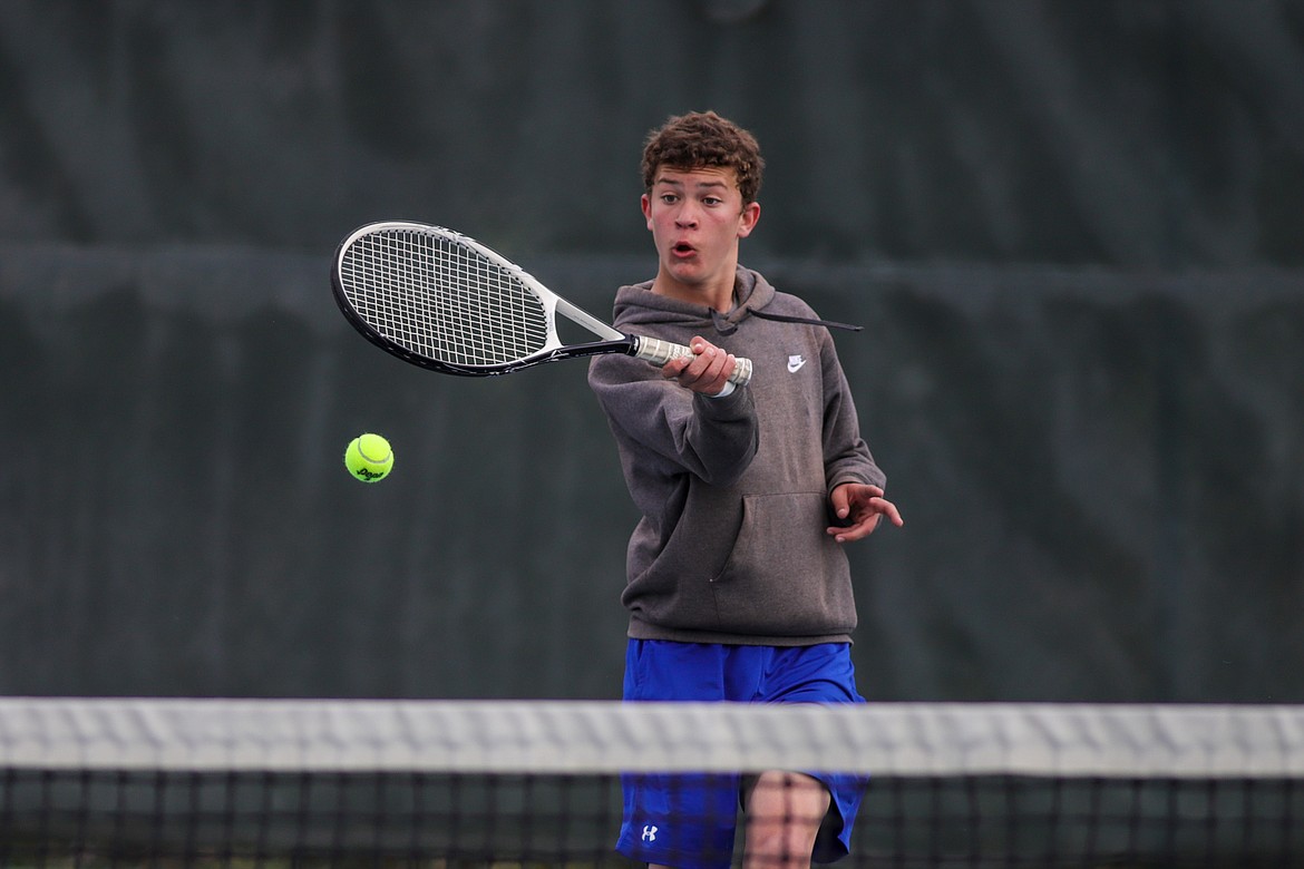 Libby's Tyler Anderson returns a volley at the Northwest A Divisional tennis tournament May 20 at Flathead Valley Community College in Kalispell. (JP Edge photo/Hungry Horse News)