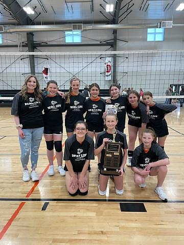 Courtesy photo
The Orange Crush won the Cereal Cup volleyball championship in the sixth- to eighth-grade division of Real Life Sports. In the front row from left are Hannah Milligan, McKenna Wilson and Riley Laney; and back row from left, Harli Folda, Millie Cushman, Gracie Wilson, Natayla Young, Chloe Hite and Vera Dahl. Not pictured are coach Brooke Folda and Bella Anderson.