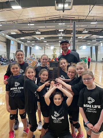 Courtesy photo
The Purple Panthers won the Cereal Cup volleyball championship in the third to fifth grade division of Real Life Sports. In the front row from left are Julia Bassols and Finley Covey; second row from left, Hannah Bassols, Katelyn Clark, Addison Baker and Kopelyn Olson; third row from left, Jayde Nelke, Olivia Baker and Iyla Oseguera; and rear, coaches Allison Rittenour and Daniel Baker.