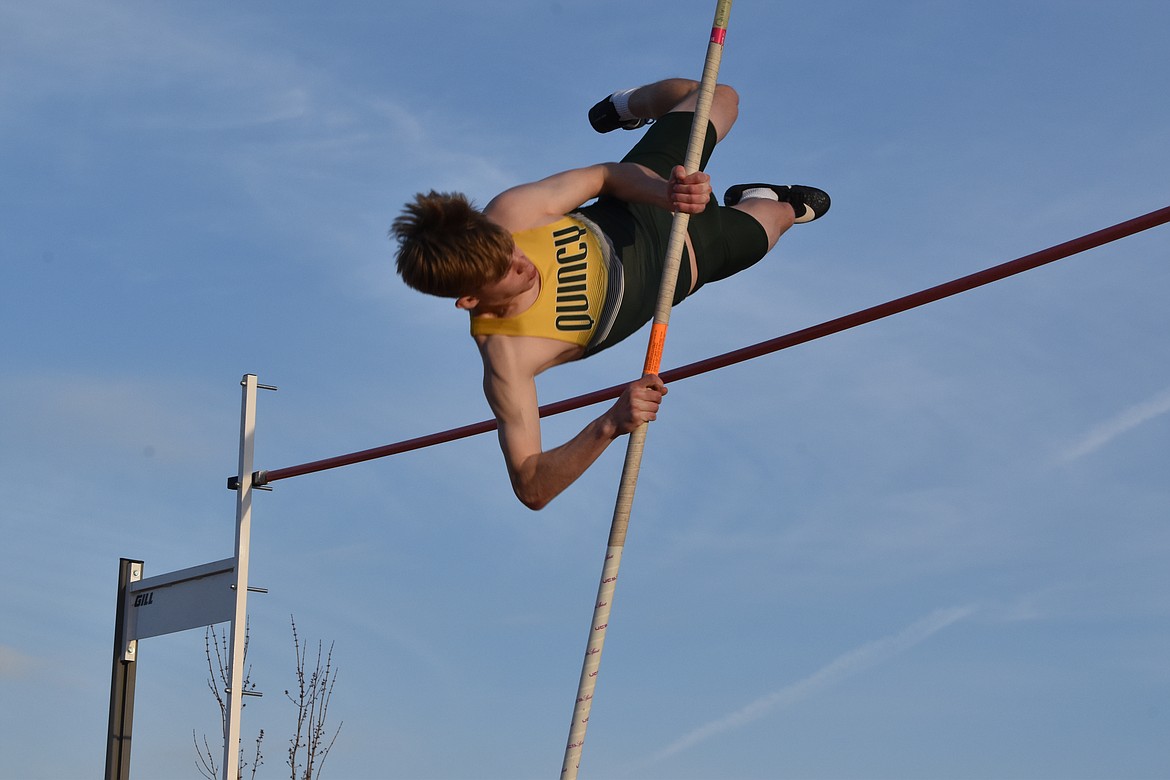 Quincy’s Aidan Heikes finishes his followthrough on a high jump attempt during a Jackrabbit track meet. Heikes joins 39 other local athletes heading to state competition.