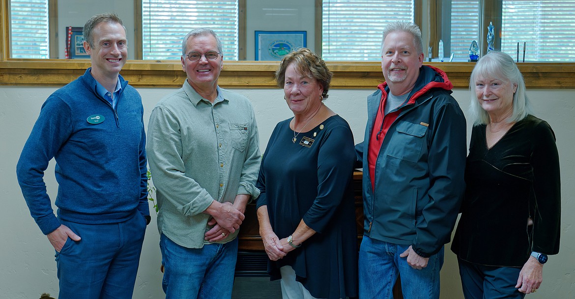 Gold and Platinum donors recognized by Turkeys & More. Evalyn Adams, coordinator of Turkeys & More, thanked recent donors who have contributed funds to help buy 1,800 Thanksgiving turkeys. Pictured from left are Brad Rasor from bankcda ($500 gold); Bill Griffiths, president of Turkeys & More; Claudia Brennan representing Coeur d'Alene Rotary for $1,000 platinum donation; Ron Strobel from Coeur d'Alene Eagles who also donated $1,000 and Barbara Fillmore, treasurer of Turkeys & More. An anonymous donor gave $5,000. Adams emphasized plans are to feed more than 7,000 people for the November holiday and additional donors have helped to raise a total of nearly $10,000 so far. An additional $42,000 will be needed to buy the turkeys by late summer. She expressed sincere thanks to all who have contributed already, and said additional donations will be welcome with checks made out to Turkeys & More and mailed to P.O. Box 267, Coeur d'Alene, ID 83816. IRS confirmation has been received by Turkeys & More as an official 501 (C) 3 nonprofit, so donations will be tax deductible. There is concern about the price of turkeys this year due to various avian (bird) flu, and Adams said the volunteer group may need to increase their total budget. Additional volunteers will be needed to have a successful turkey distribution in November. Please contact Evalyn Adams at evalynera@hotmail.com or call 208 765-5535.