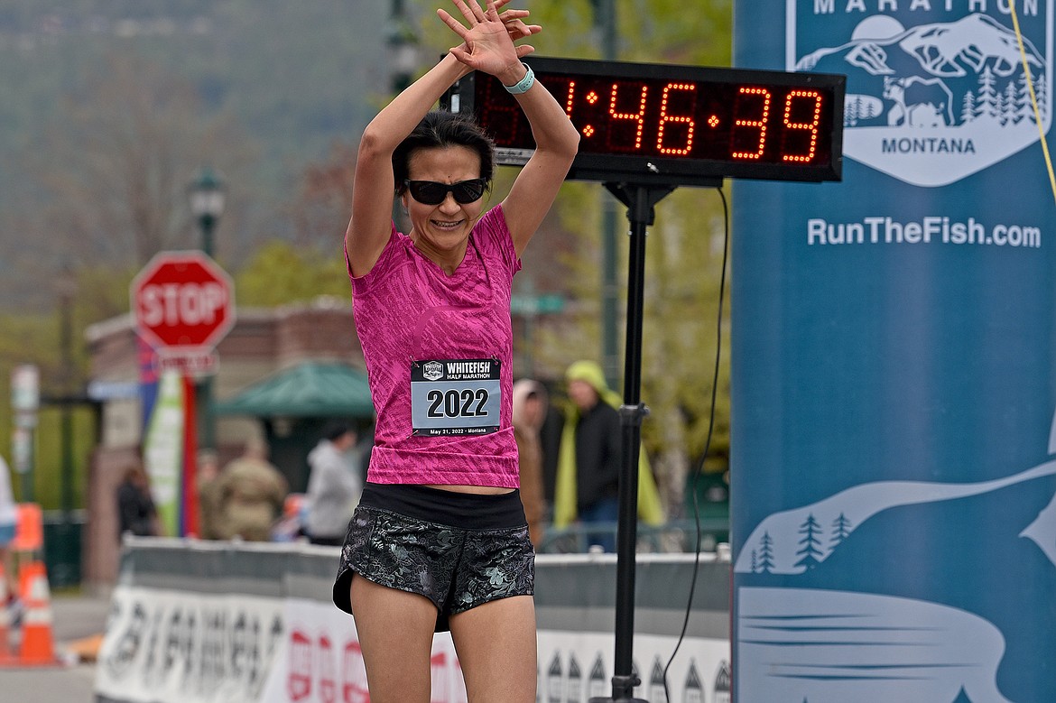 Whitefish resident Stella Sharbono celebrates finishing the Whitefish Half Marathon on Saturday. (Whitney England/Whitefish Pilot)