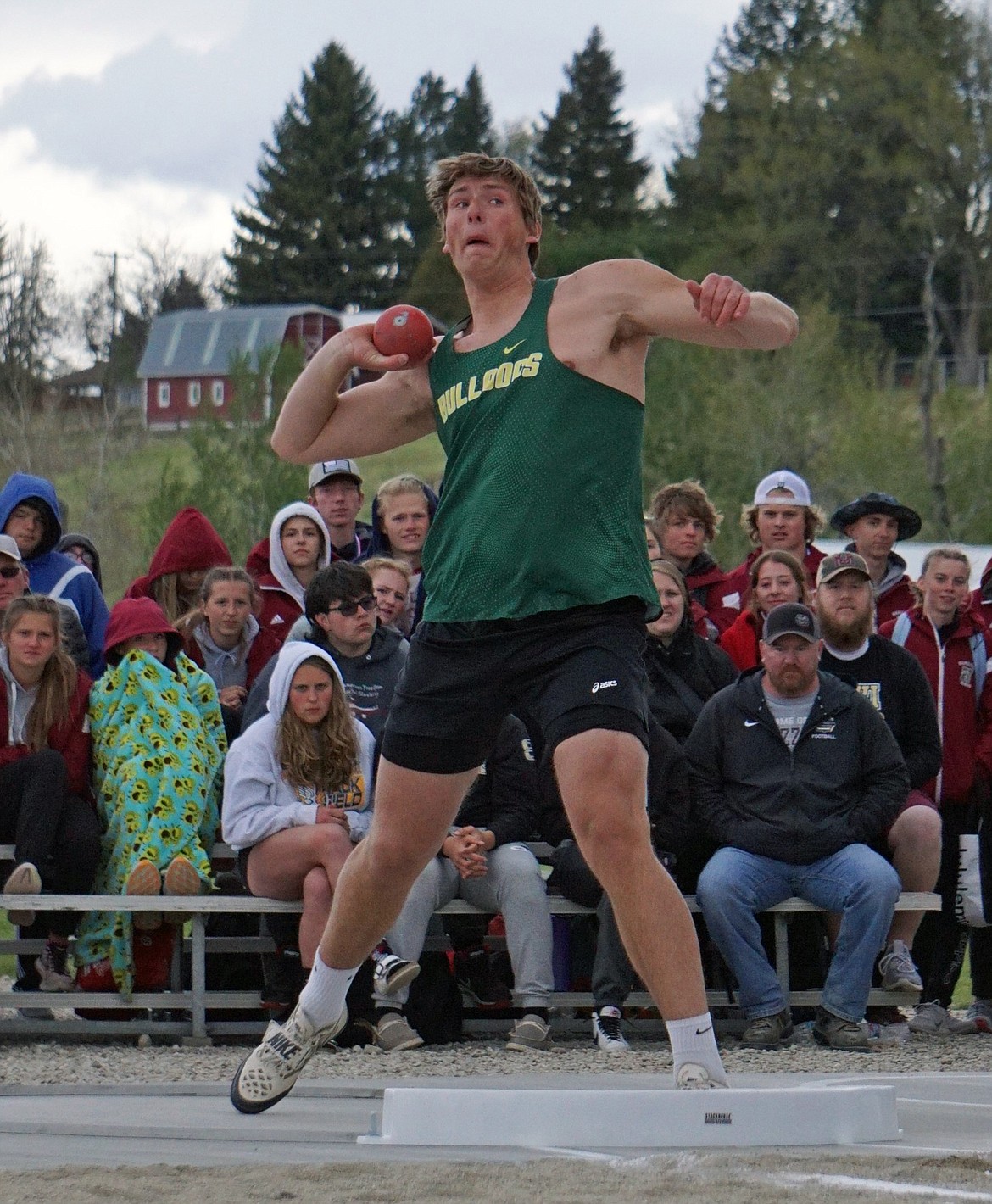 Whitefish senior Talon Holmquist with a record-breaking throw in shot put to take the title at the Western A Divisional meet in Hamilton on Friday and Saturday. (Matt Weller photo)