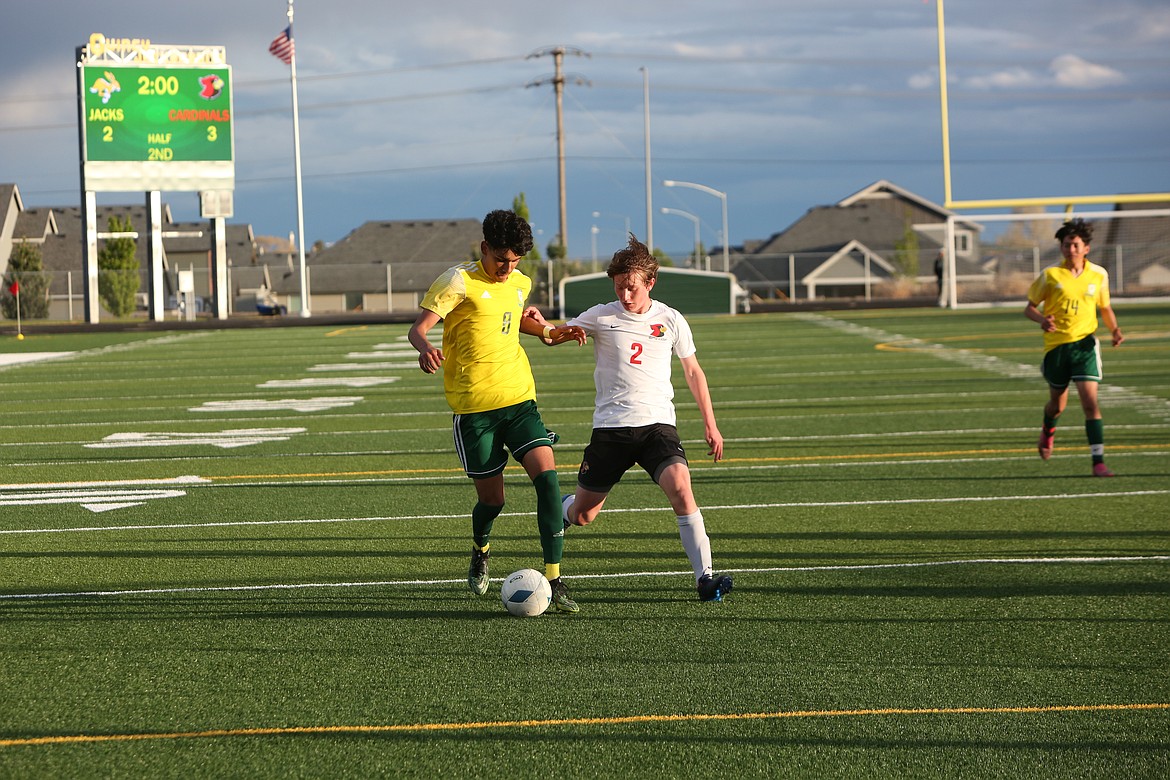 Midfielder Isaac Lopez pushes the ball upfield in the waning minutes of the Jackrabbits’ loss to Seattle Academy on May 20.
