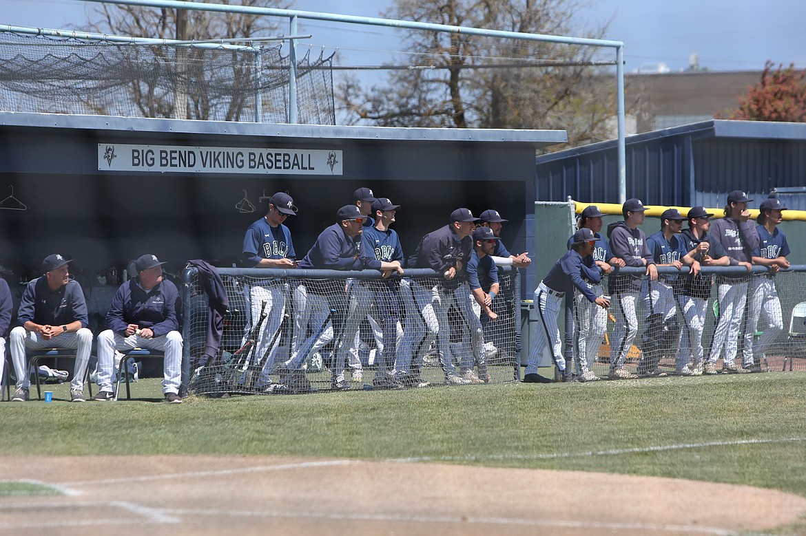 The Big Bend dugout peers out to see the outcome of a hit ball in the Vikings’ 19-7 win over Mount Hood on May 21.