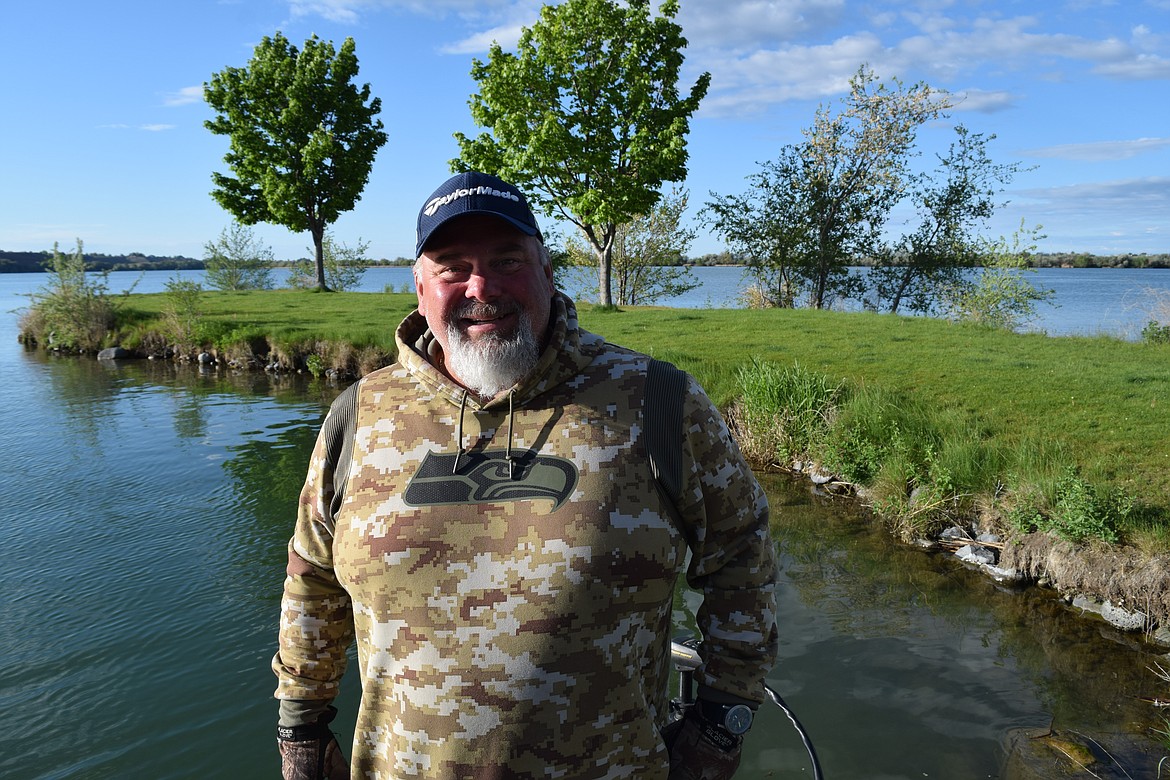 Moses Lake Carp Classic organizer and avid sportsman Ty Swarthout on his boat Saturday during the carp tournament. While Swarthout has started carp hunting — done with a bow and arrow — he stayed on the sidelines for the tournament.