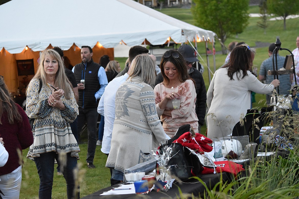 Along with a dinner and live auction, there was a silent auction for attendees to browse as they enjoyed live music and mingling.