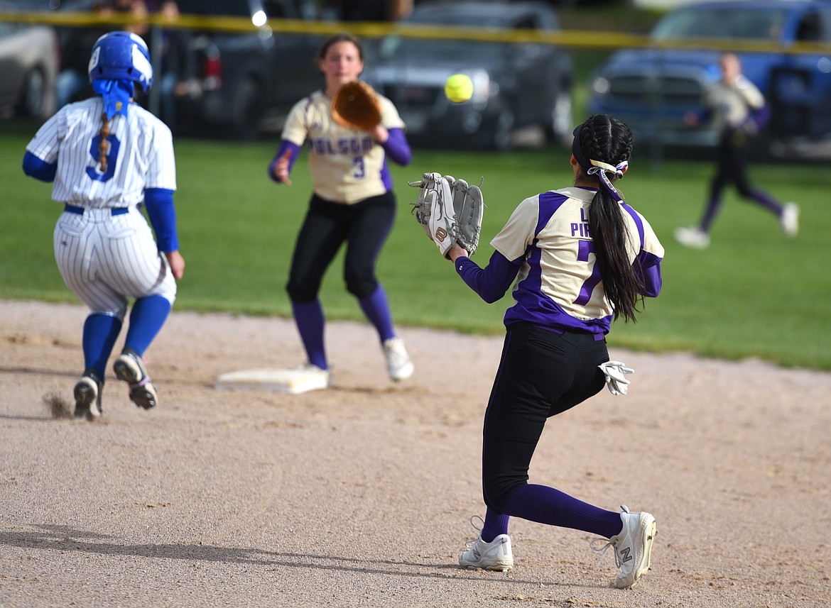 Second baseman Jaivin BadBear throws to shortstop Nikki Kendall for the force out at second against Libby.(Scot Heisel/Lake County Leader)