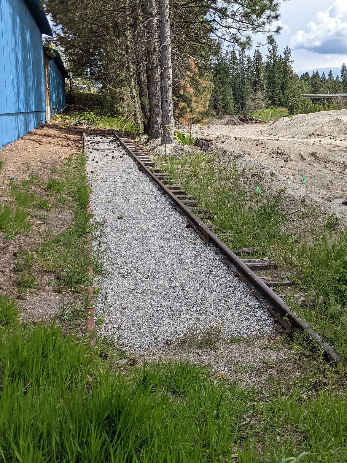 The 100 feet of visible railroad track behind the Hansens' property near Northwest Boulevard and Lacrosse Avenue. The tracks are believed to have been a part of the old Coeur d'Alene & Spokane Railroad Company.