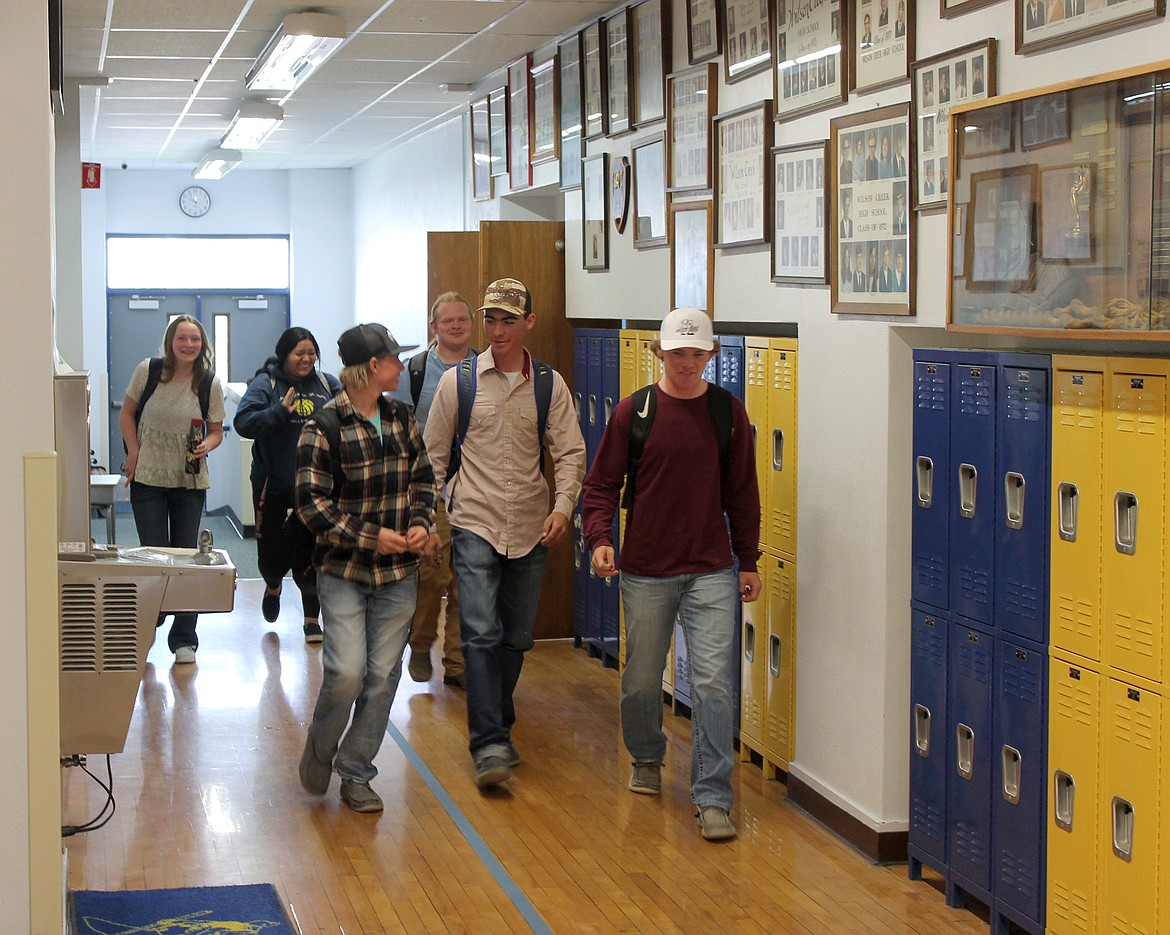 Wilson Creek High School seniors stream down the hall between classes on Wednesday. From left: Kesiah Cook, Madelayna Grajeda, Taeven Brashear, Elijah Adamson. Kass Newman, Davey McMillan.