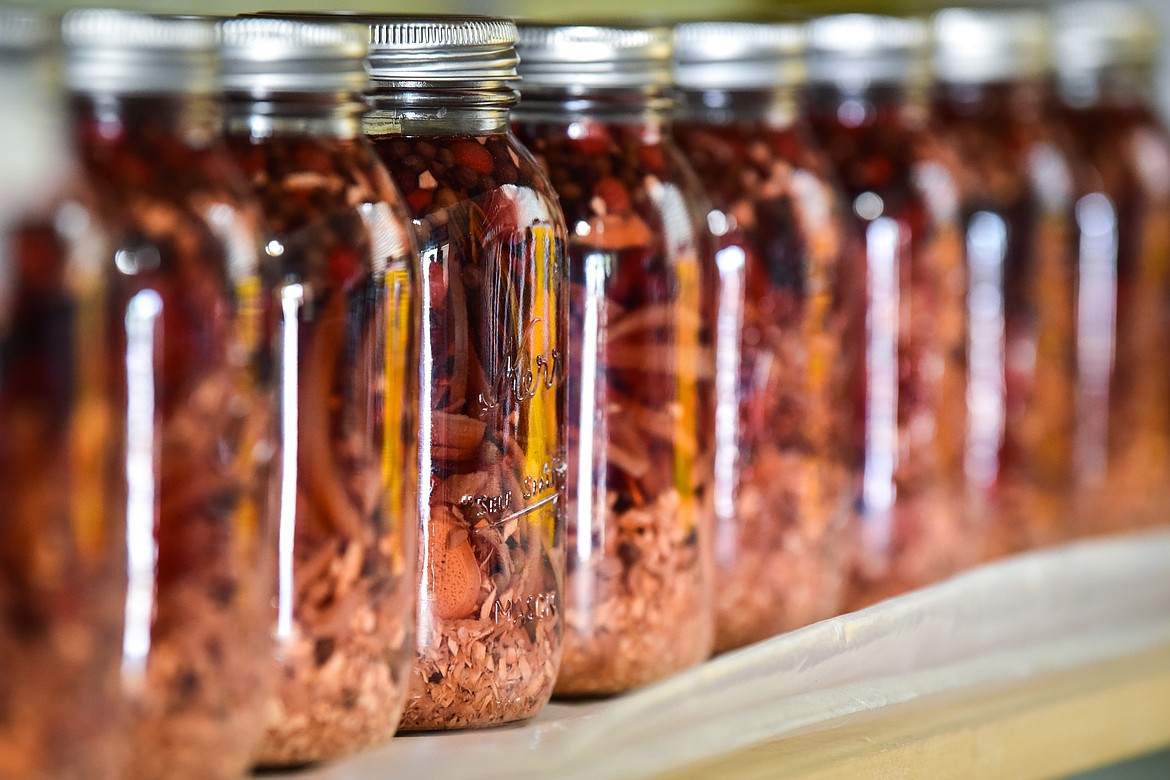 Jars of fire cider inside the apothecary at SpiritWorks Trilogy near Whitefish on Thursday, May 26. (Casey Kreider/Daily Inter Lake)