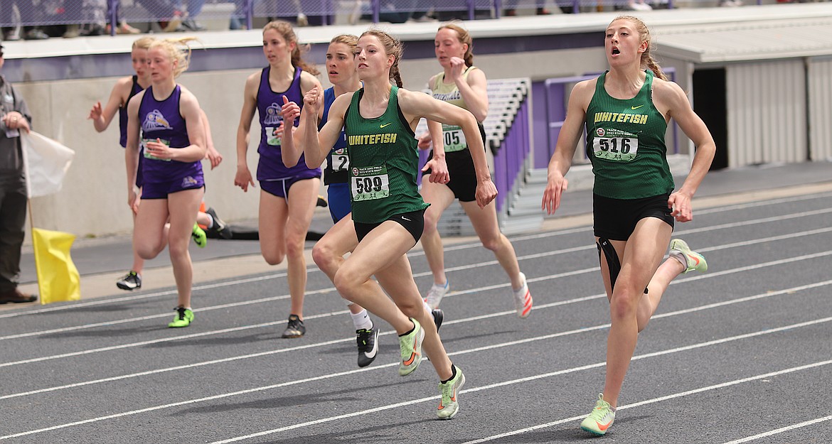 Whitefish’s Hailey Ells (left), and Brooke Zetooney (right) run the girls 100-meters at the State AA-A track and field championships in Butte on Saturday, May 28. Zetooney won the event, Ells was fourth, and the Whitefish girls won the team title. (Bill Foley/ButteSports.com)