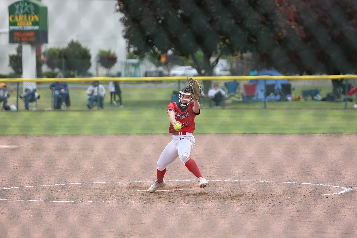 Othello sophomore Amarie Guzman winds up for a pitch in Othello’s 6-0 shutout victory over West Valley on May 27, 2022. Guzman had 13 strikeouts against West Valley.