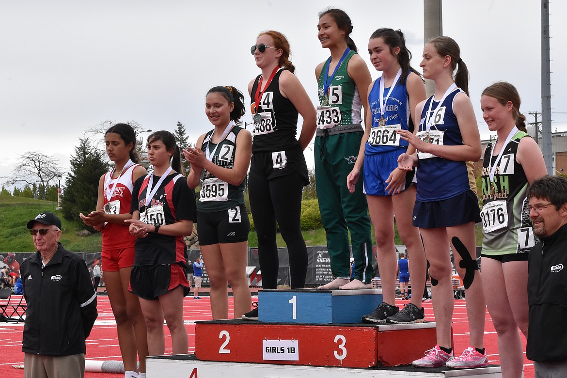 Odessa sophomore Hayden Schuh placed 1st and 2nd in the finals of the 100-meter hurdles and the 300-meter hurdles respectively. She also placed 2nd in the javelin finals. Pictured is Schuh receiving her second-place medal for the 300-meter hurdles.